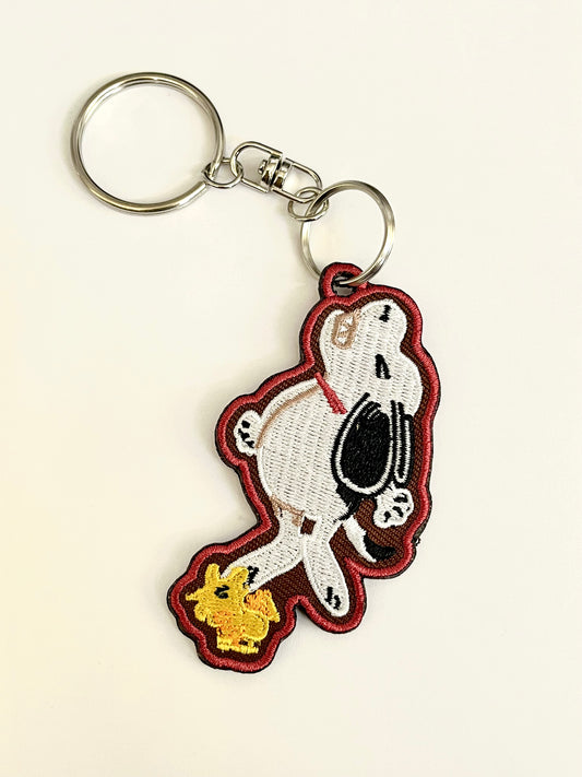 ankle biter sn00py embroidered keychain tag